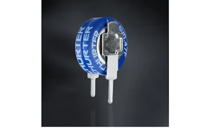 Blue circular battery or electronic component with white terminals