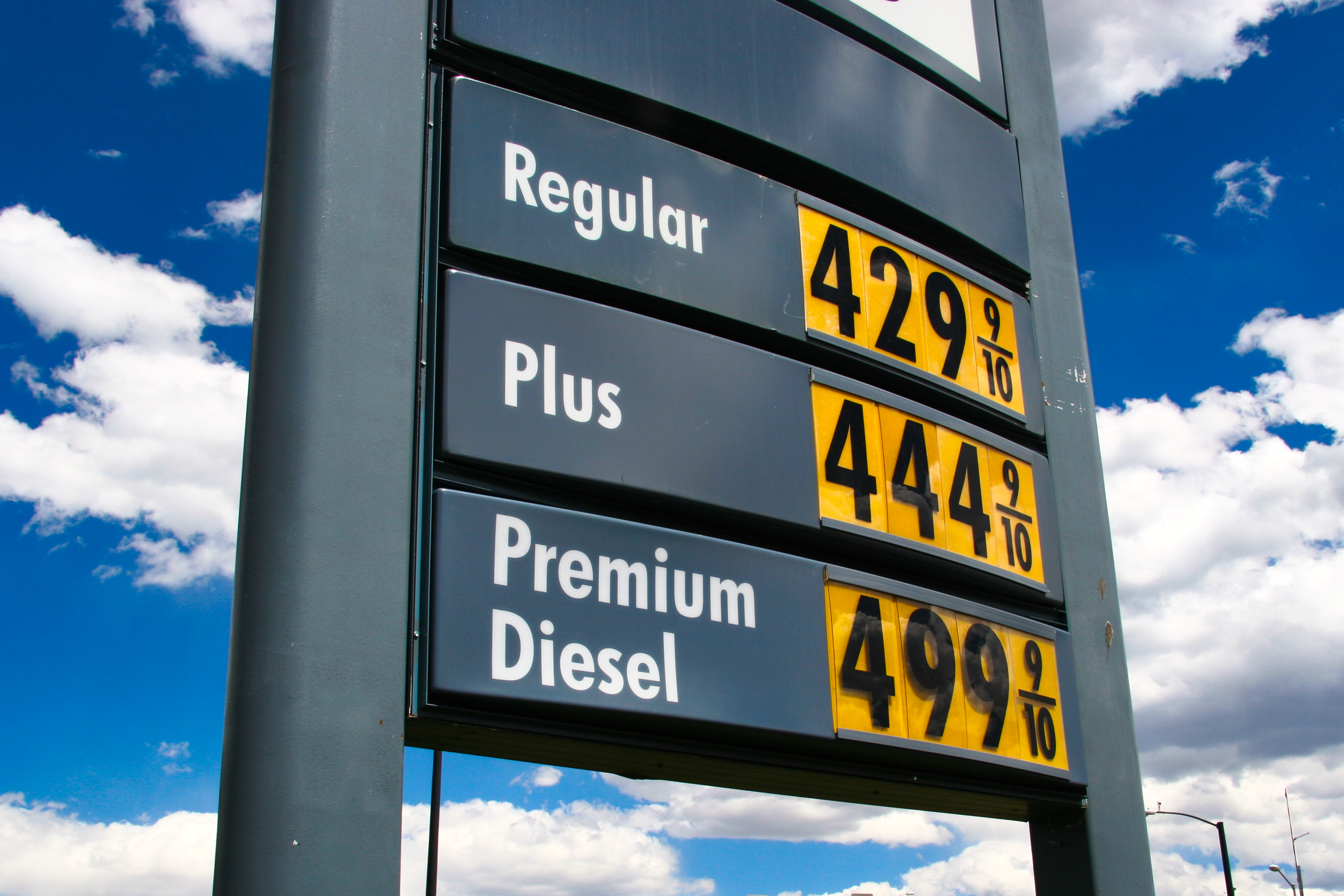 Gas station price sign showing Regular at $4.29, Plus at $4.44, and Premium Diesel at $4.99 per gallon
