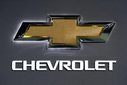 Chevrolet gold bowtie logo with chrome trim and brand name text