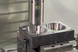 CNC press machine with cylindrical punch tool positioned above metal workpiece with two circular cavities