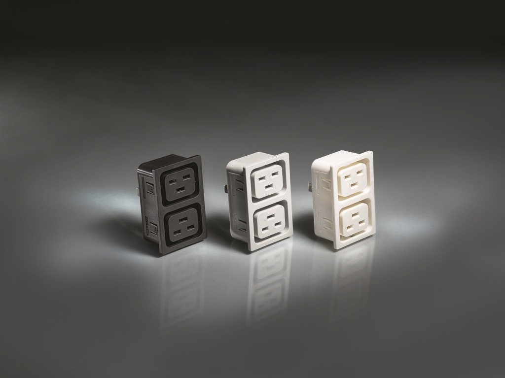 Three electrical outlet designs in black, white, and beige with dual socket configurations displayed on reflective surface
