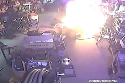 Security camera footage from bike storage area showing bright light source and efire branding timestamp
