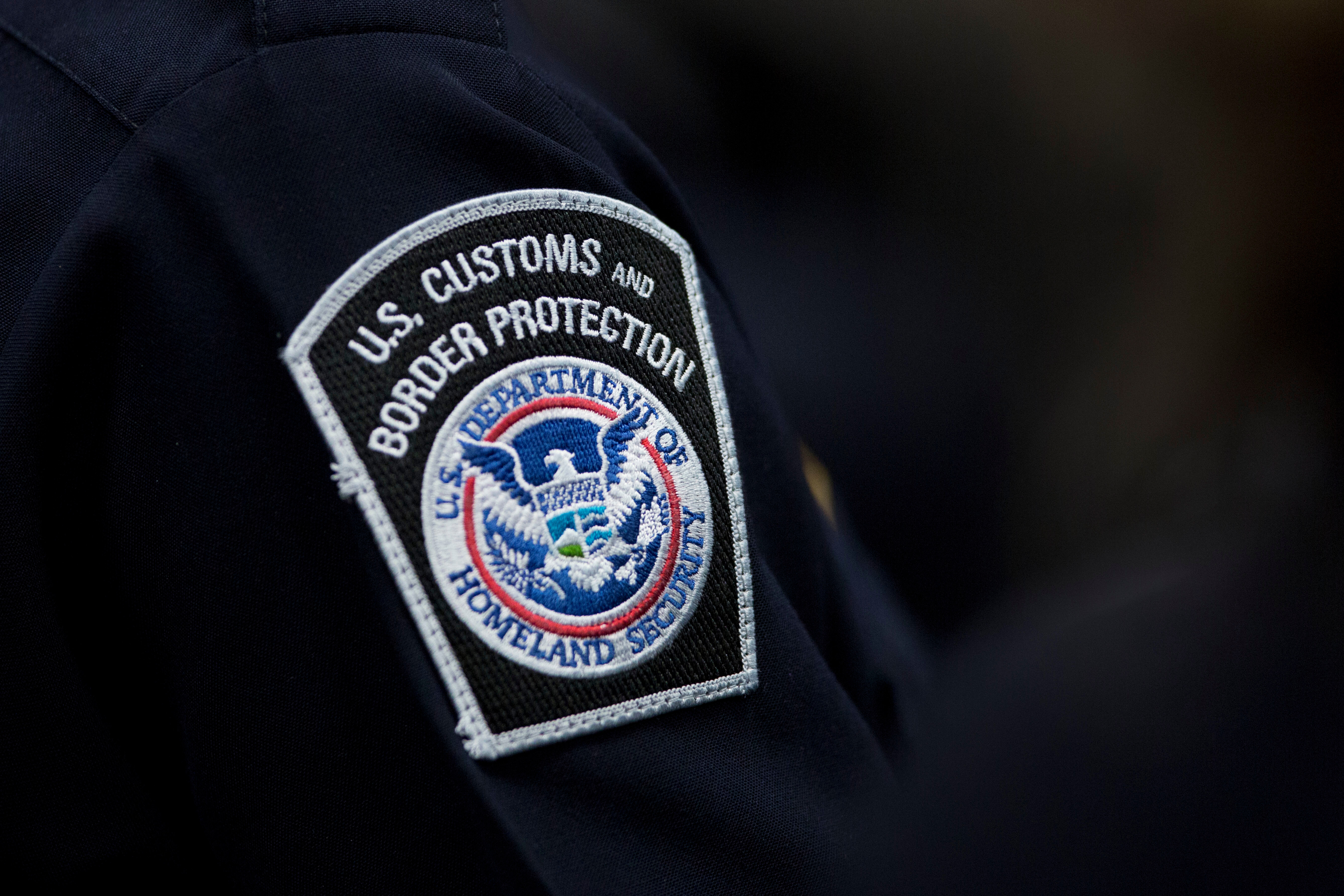 U.S. Customs and Border Protection patch on dark uniform sleeve