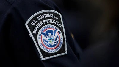 U.S. Customs and Border Protection patch on dark uniform sleeve