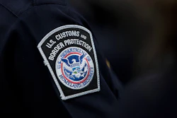 U.S. Customs and Border Protection patch on dark uniform sleeve
