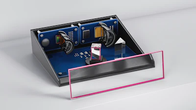 Internal electronics assembly with blue circuit board, components, and highlighted lower section