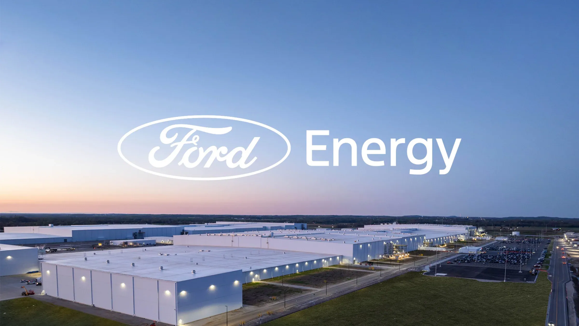 Ford Energy logo displayed over an aerial view of a large modern industrial manufacturing facility at dusk