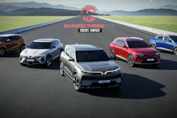 Five VinFast electric vehicles displayed on a road with mountain landscape background