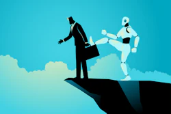 Businessman in suit kicked by white robot on cliff edge against blue sky with clouds