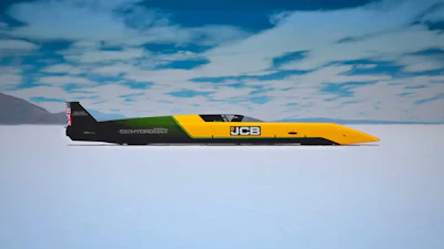 Yellow and black JCB Bloodhound land speed record vehicle on white salt flat under blue sky