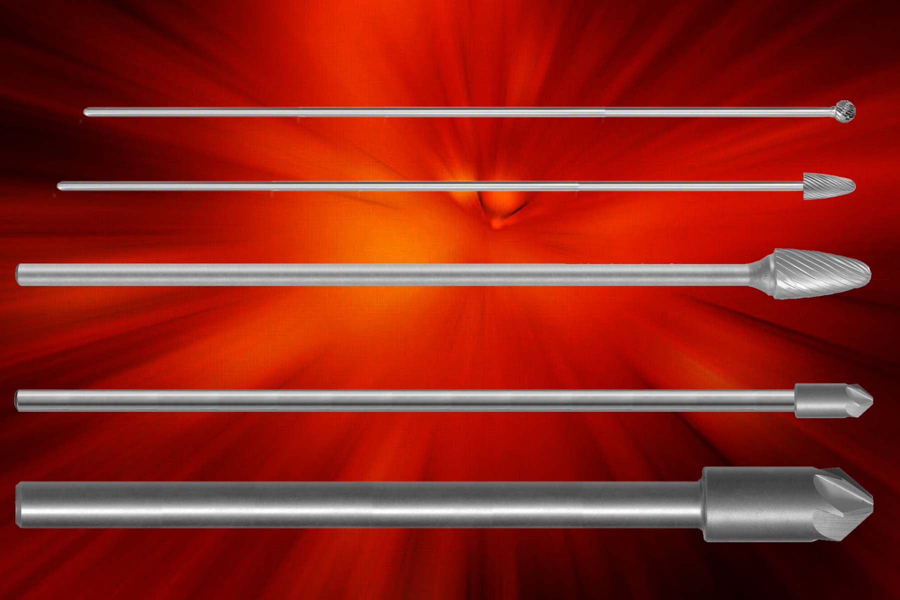 Five metallic industrial cutting bits and burrs arranged horizontally on red background