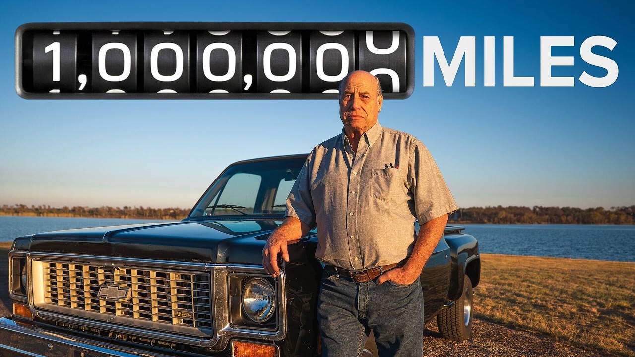 Man standing beside vintage Chevrolet truck with 1 million miles odometer reading displayed