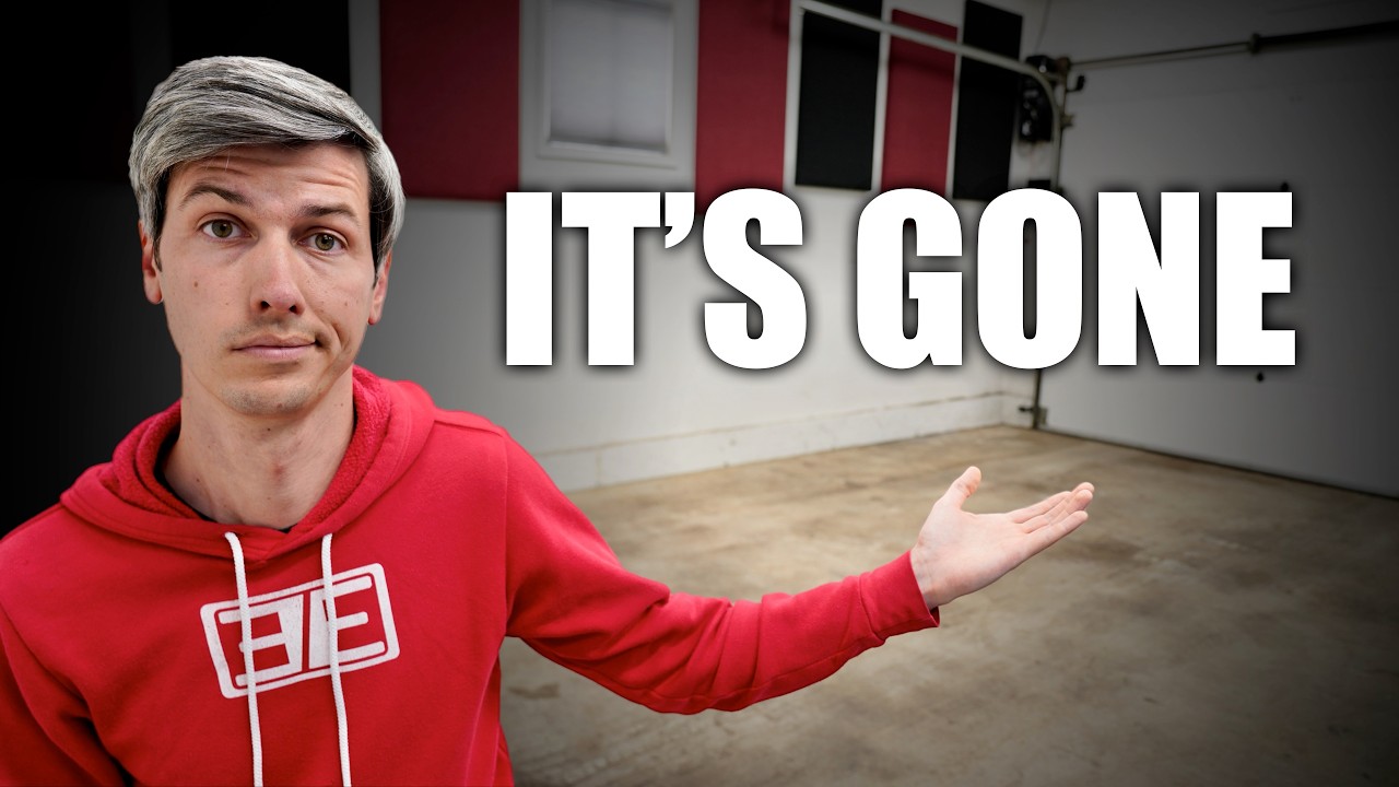 Man in red hoodie with uncertain expression gesturing in empty room with 'It's Gone' text overlay