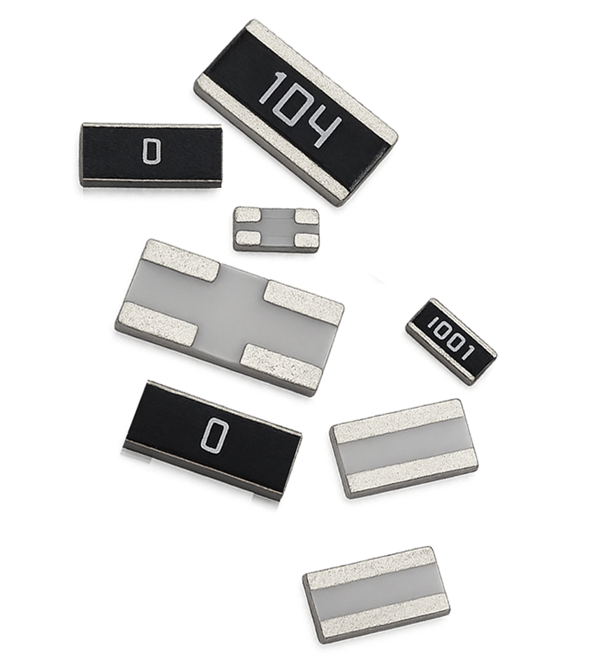 Assorted electronic components including resistors and capacitors with silver metallic terminals and black or gray bodies