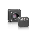 Industrial machine vision camera system with sensor head and control unit featuring multiple connection ports