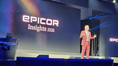 EPICOR Insights 2026 conference presentation with speaker on stage