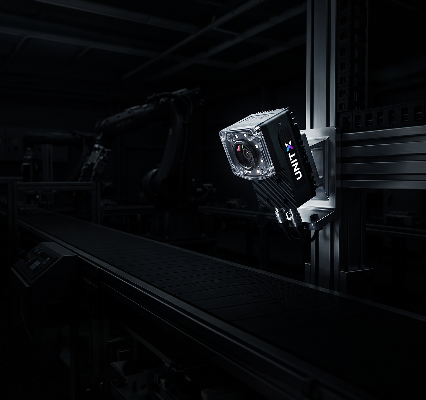Unity-branded professional camera mounted on industrial equipment in dark studio setting