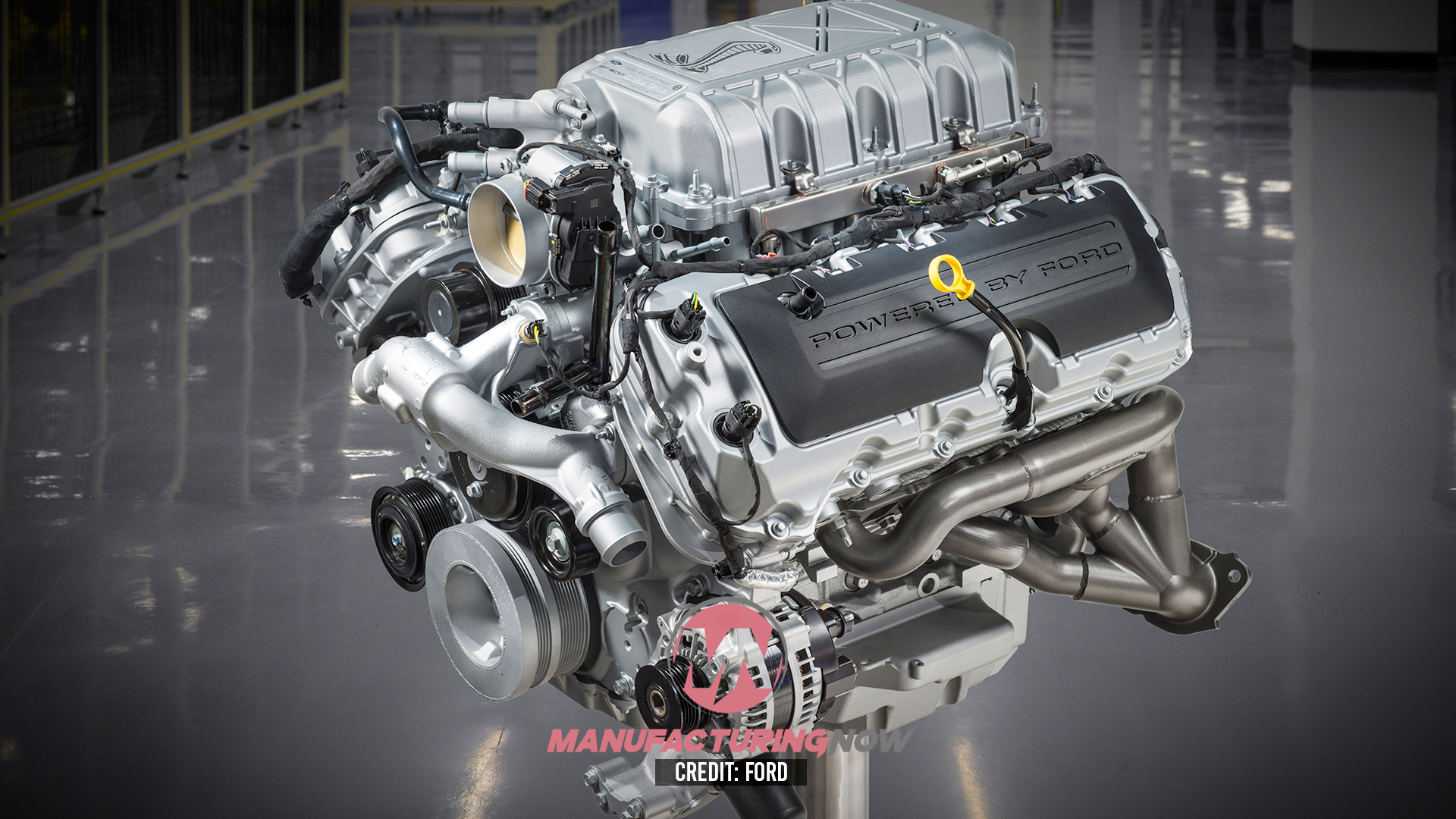 Ford high-performance V8 engine assembly with supercharger in manufacturing facility