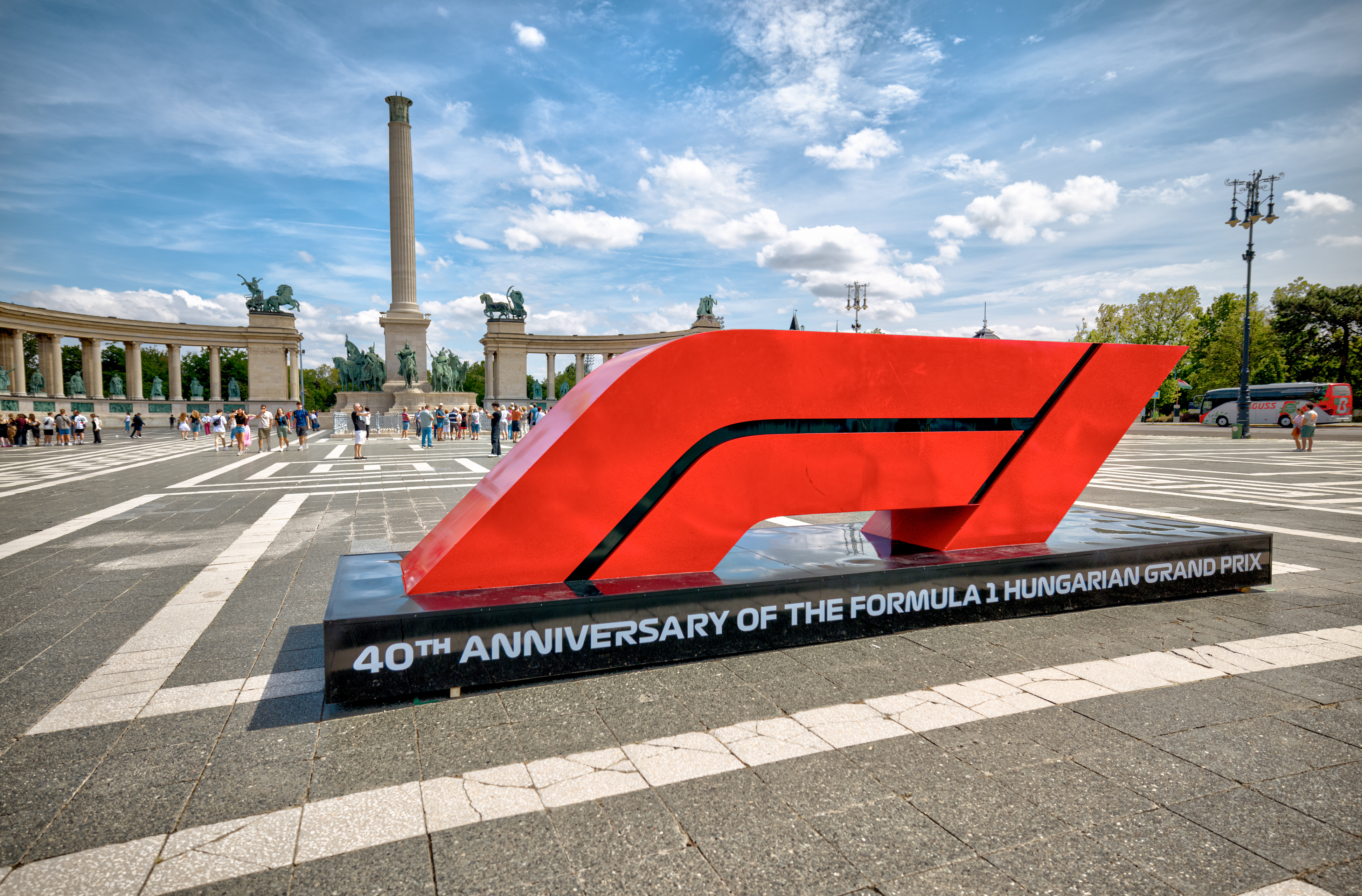 Red Formula 1 logo monument celebrating 40th anniversary of Hungarian Grand Prix in Heroes' Square, Budapest