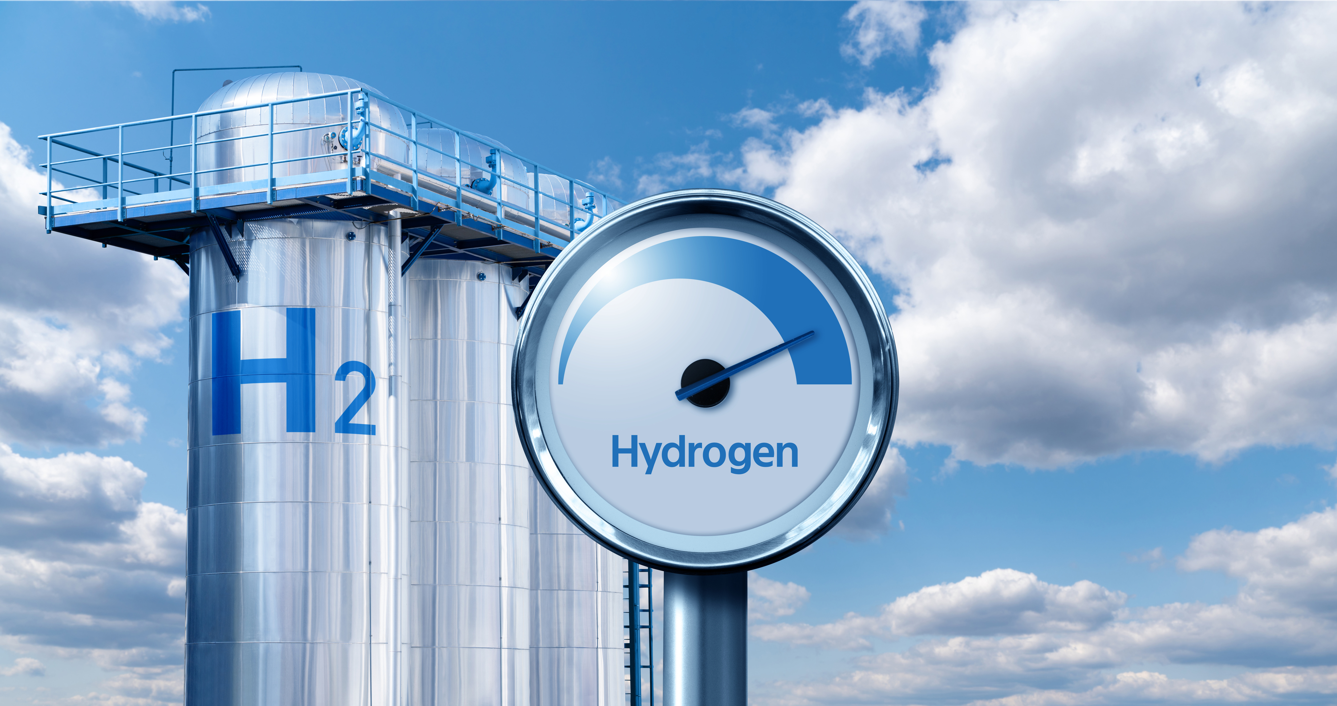 Hydrogen storage tank with gauge meter displaying hydrogen fuel capacity against blue sky