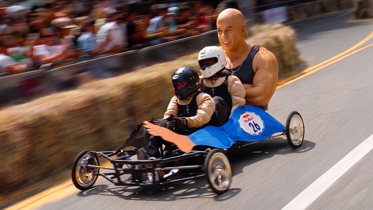 Gravity-powered soapbox cart racing downhill with three drivers in helmets on a street lined with spectators.