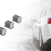 Three surface-mount electronic components displayed next to a white sedan with red taillights