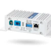 Industrial networking device with Ethernet ports, fiber optic connectors, and terminal blocks mounted on white casing