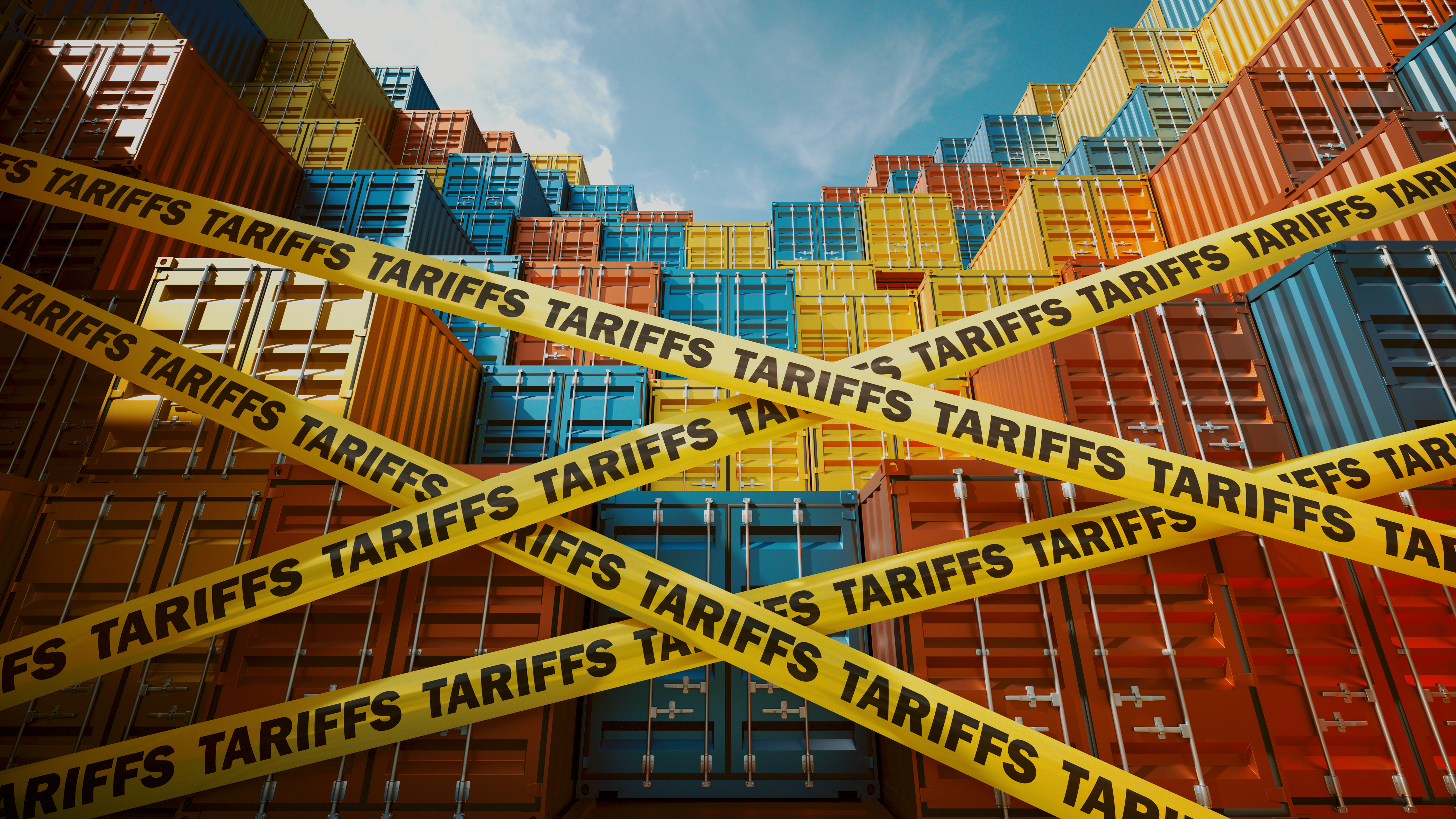 Stacked shipping containers at port with yellow caution tape labeled 'TARIFFS' symbolizing trade restrictions and import costs.