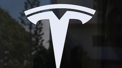 Tesla logo - white stylized T symbol