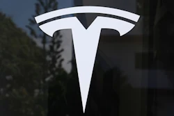 Tesla logo - white stylized T symbol
