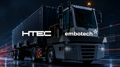 HTEC and Embotech branded commercial truck with cargo container in digital cityscape setting