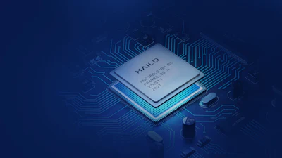 HAILO processor chip mounted on blue circuit board with glowing cyan accents