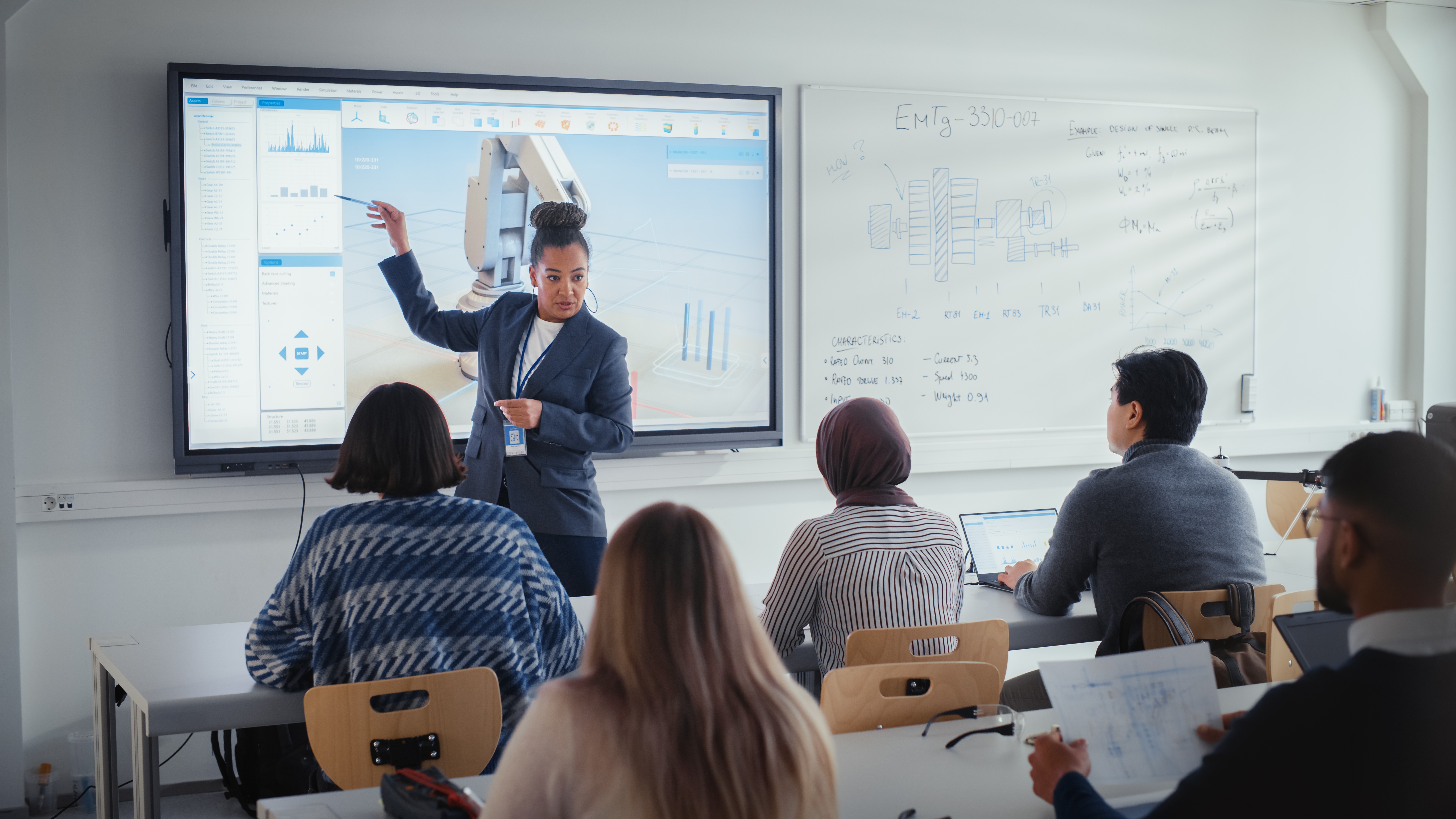 Business professional presenting data analytics dashboard to seated audience in modern conference room