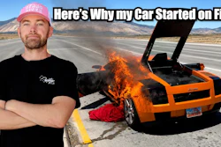 Man in pink cap posing next to burning orange sports car on desert highway with mountains in background