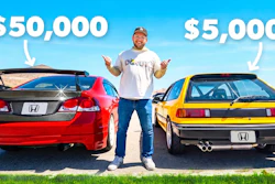 Man standing between red and yellow Honda cars with $50,000 and $5,000 price labels