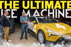 Two men discussing a yellow Lotus electric vehicle in a garage with dry ice effects and 'The Ultimate Ice Machine' text overlay