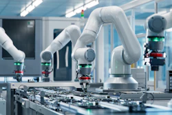 Collaborative robotic arms assembling electronic components on circuit boards in a modern manufacturing facility