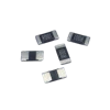 Five surface-mount resistor components with silver end caps and black marking bands displaying alphanumeric codes