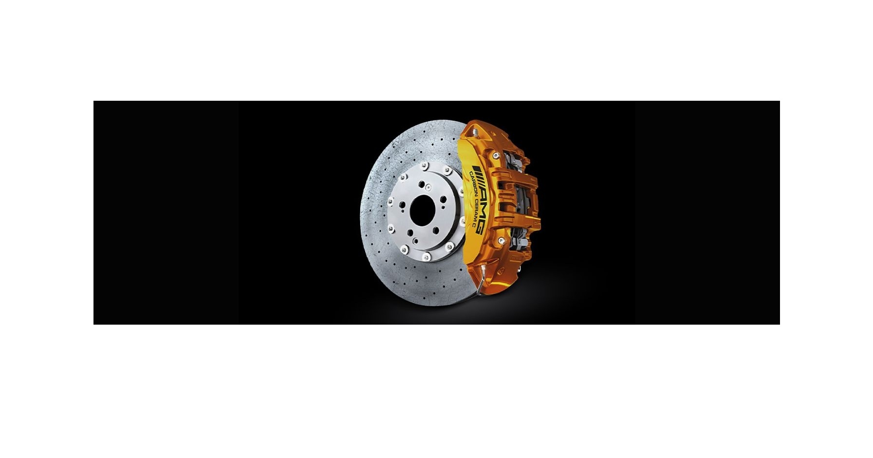 Gold brake caliper with perforated rotor disc automotive component