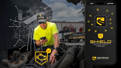 Construction worker in safety gear using Shield mobile app on smartphone at job site