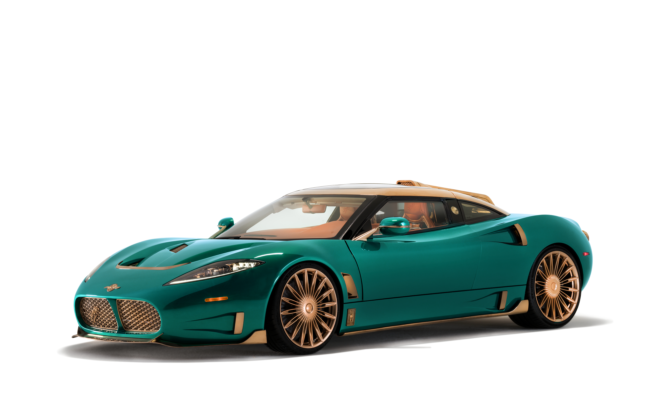 Teal and gold luxury sports car with distinctive grille and aerodynamic design on white background