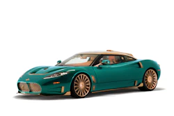 Teal and gold luxury sports car with distinctive grille and aerodynamic design on white background
