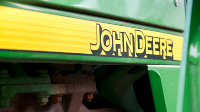 John Deere logo on green agricultural machinery