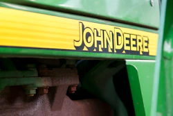 John Deere logo on green agricultural machinery