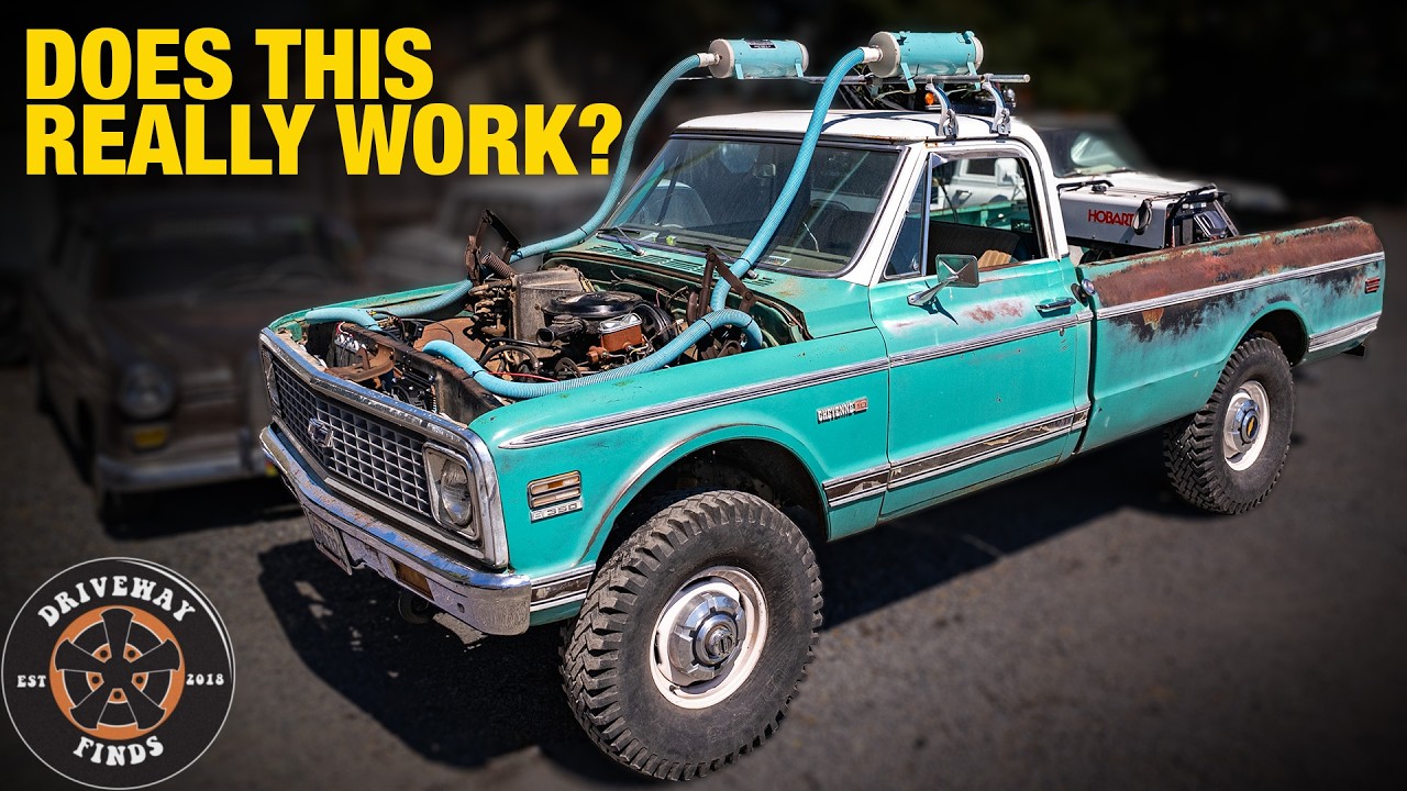 Turquoise 1972 Chevrolet pickup truck with open hood displaying engine, roof rack, and Driveway Finds logo watermark