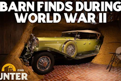Vintage yellow convertible automobile discovered in barn during World War II restoration project