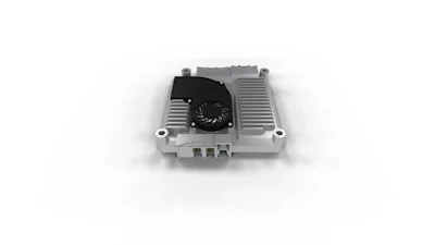 Gray electronic component with cooling fan and aluminum heat sink fins mounted on white background