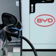 A BYD electric vehicle charges at a dealership in Camacari, Bahia state, Brazil, Friday, March 7, 2025.