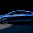 Blue metallic concept car with sleek aerodynamic design and futuristic styling on dark background