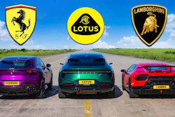 Three luxury sports cars lined up on a road displaying Ferrari, Lotus, and Lamborghini branding with logos above.
